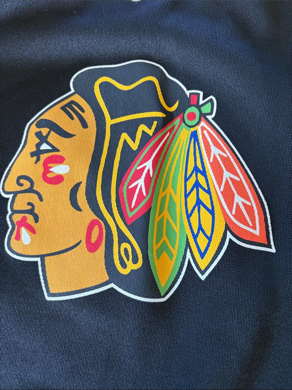 NHL CCM Black Jersey with Red Trim and Multicolor Logos